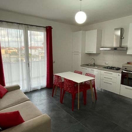 Casa Vacanza Colors Porto Torres Bagian luar foto
