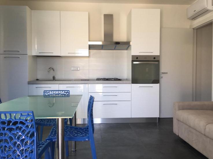 Casa Vacanza Colors Porto Torres Bagian luar foto