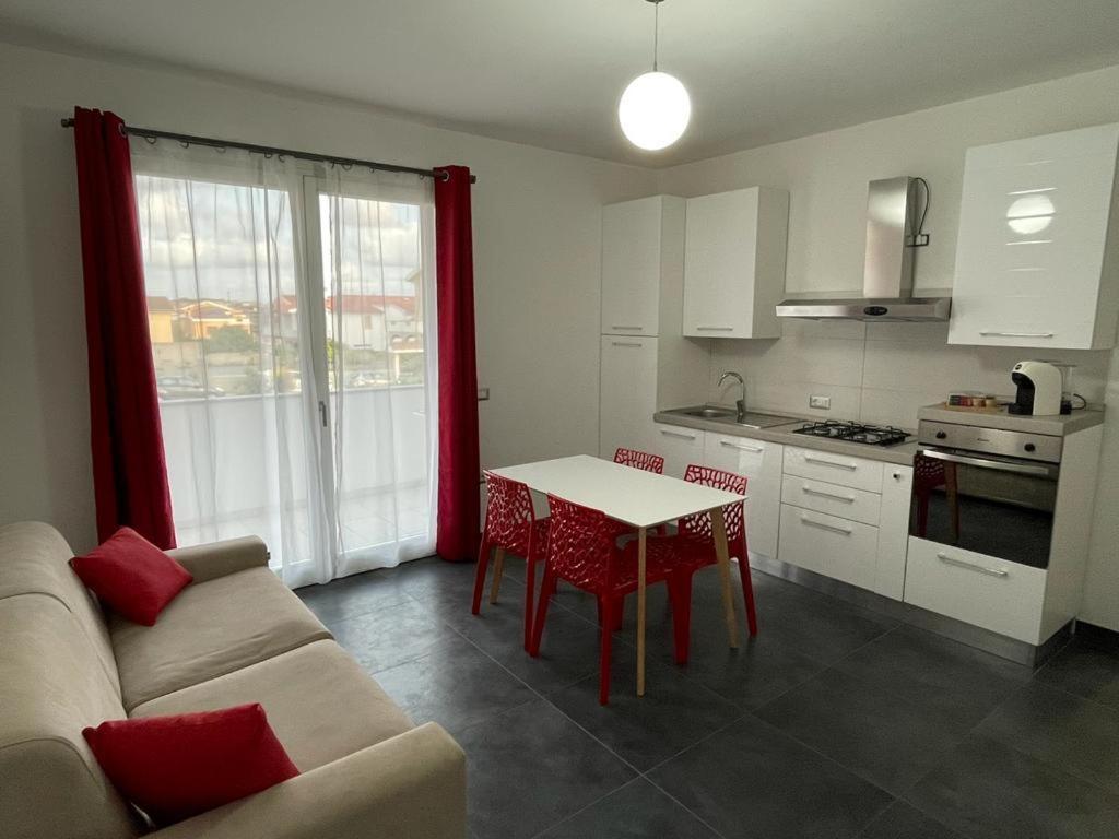 Casa Vacanza Colors Porto Torres Bagian luar foto